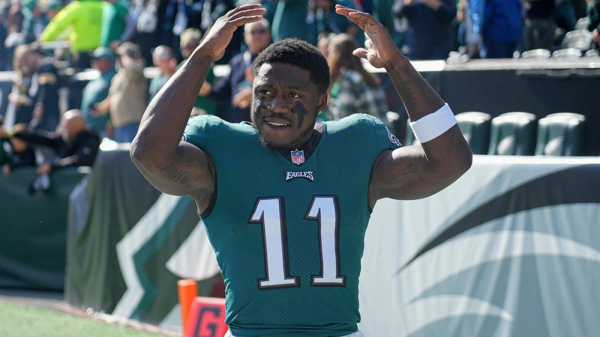 Eagles Soar Past Rams in Thrilling Sunday Night Showdown:  A.J. Brown's Dominance and Barkley's Record-Breaking Run!