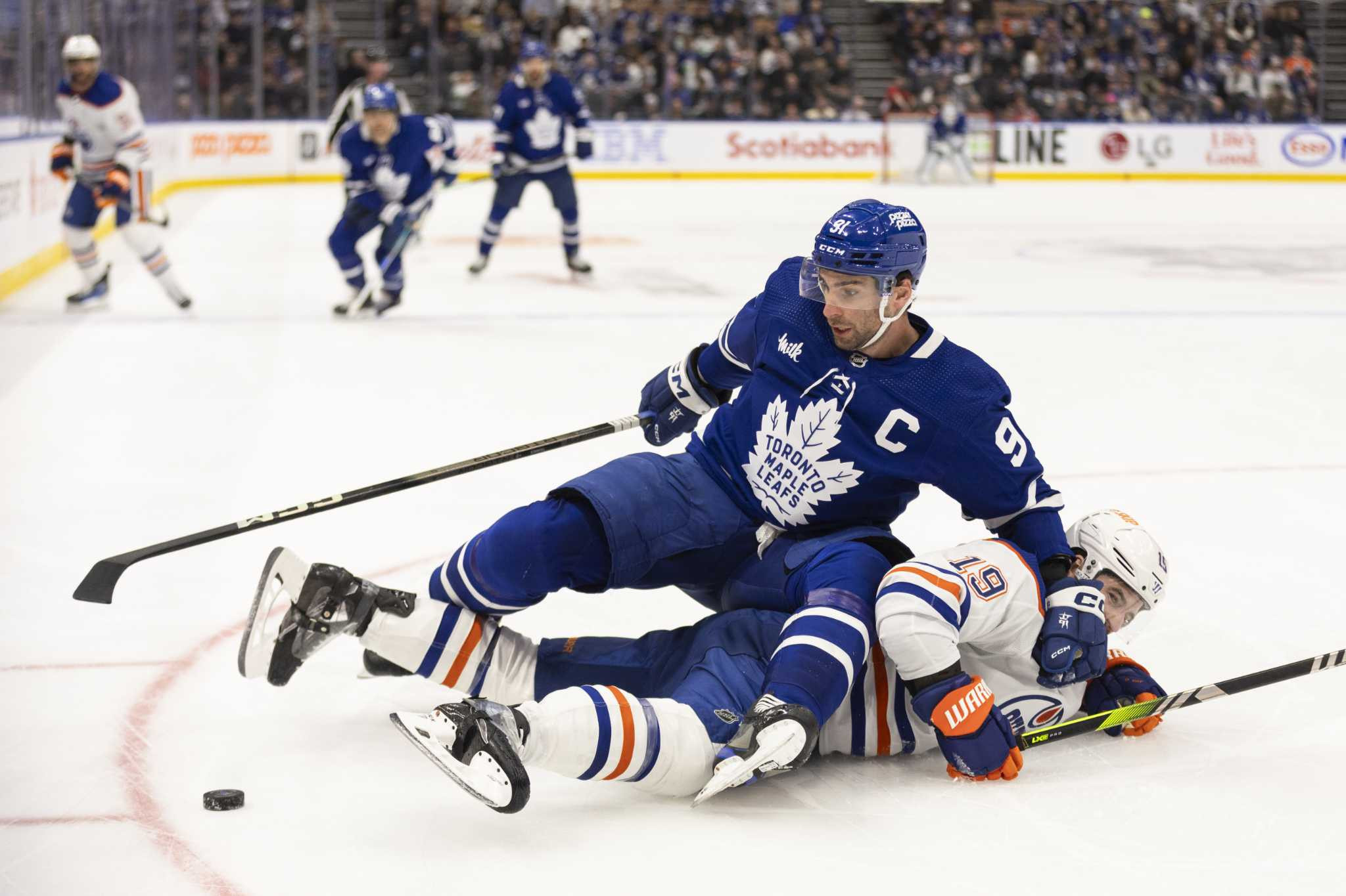 McMann, Holmberg Shine as Maple Leafs Beat Oilers 6-3