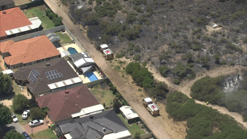 Port Kennedy Bushfire Downgraded: Residents Urged to Stay Alert as Firefighters Battle Blaze
